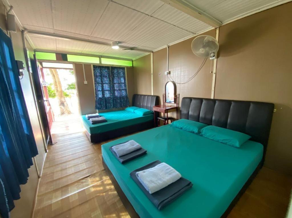 Sri Sentosa Chalet Kampong Mukut ภายนอก รูปภาพ